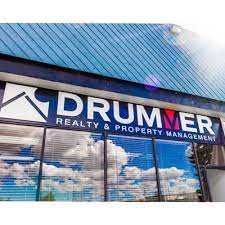 Drummer Realty & Property Management Logo