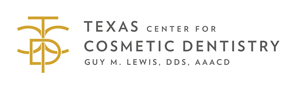 Guy M. Lewis, DDS, AAACD Logo