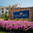 School Bell Apartments Logo