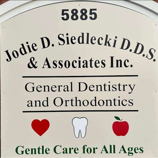 Jodie D Siedlecki, D.D.S. & Associates, Inc. Logo