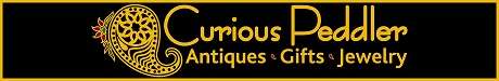 The Curious Peddler Logo