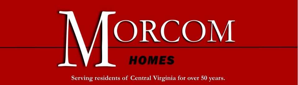 Morcom Building, Inc. Logo