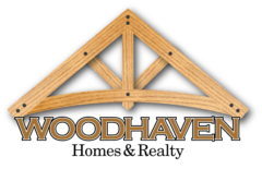 Woodhaven Homes & Realty, Inc. Logo