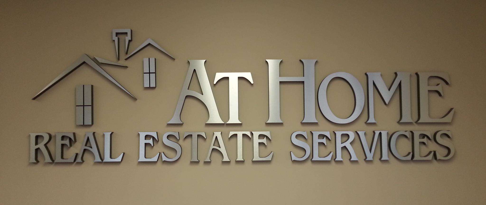 At Home Real Estate Services of Southwest MO Logo