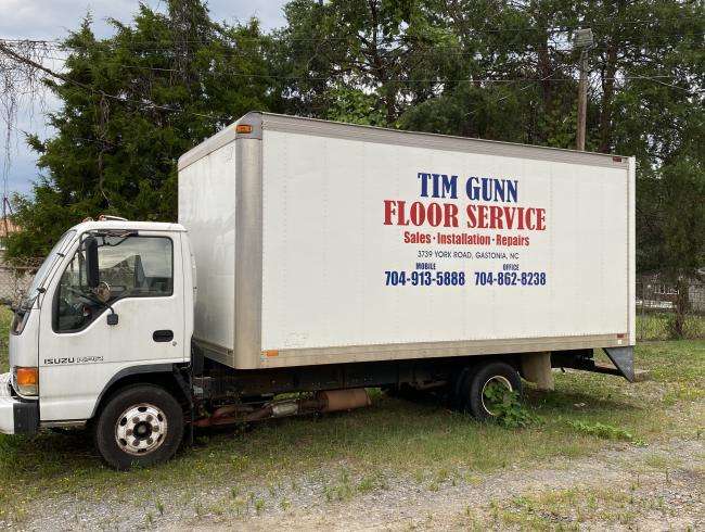 Tim Gunn Floor Service Logo