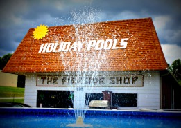 Holiday Pools & Fireside Shop Logo