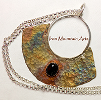 Iron Mountain Arts/ That Frit Girl, LLC. Logo