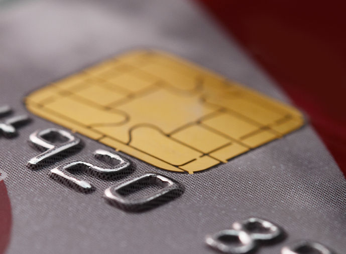 Detail of a credit card with electric chip.