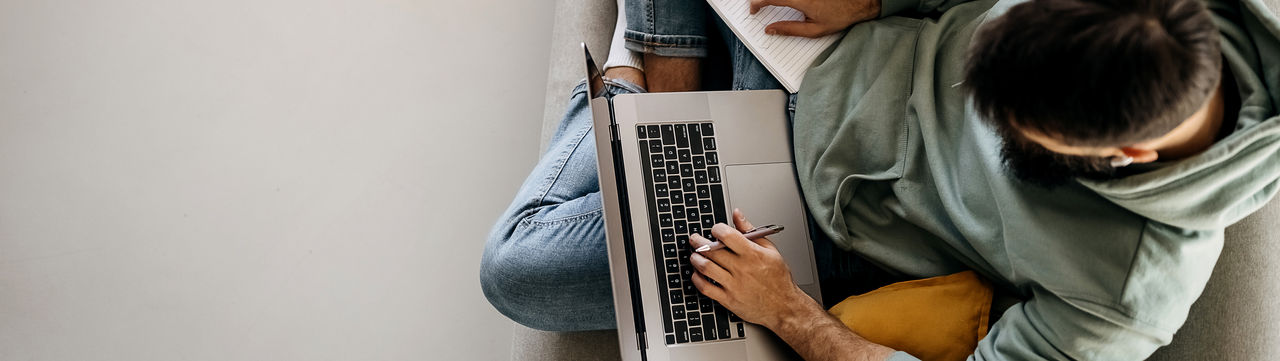 business person typing on computer