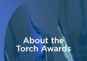 Image says, "About the Torch Awards" 