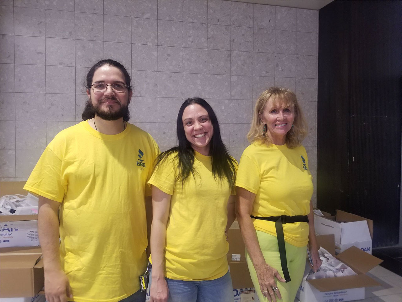 BBB serving the Heart of Texas staff putting together bags for Susan G. Komen.