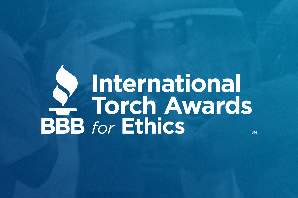 The International Torch Awards for Ethics logo over a blue background.