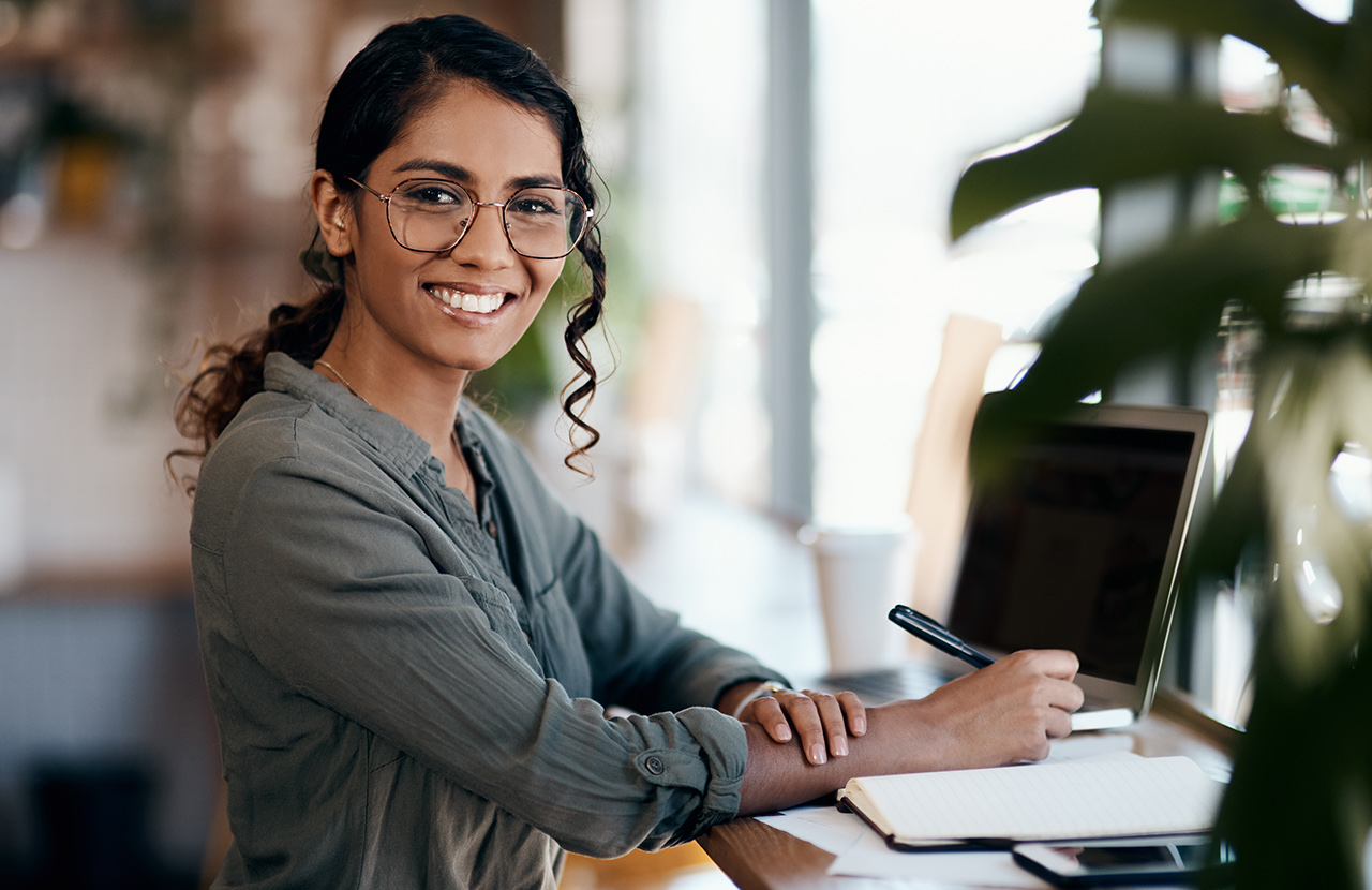 Shot of a young woman working in a cafe