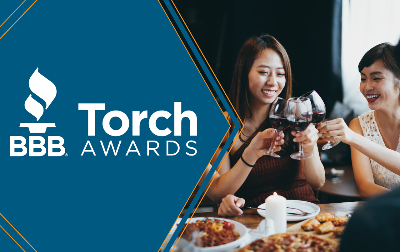 torch awards - group toasting at dinner