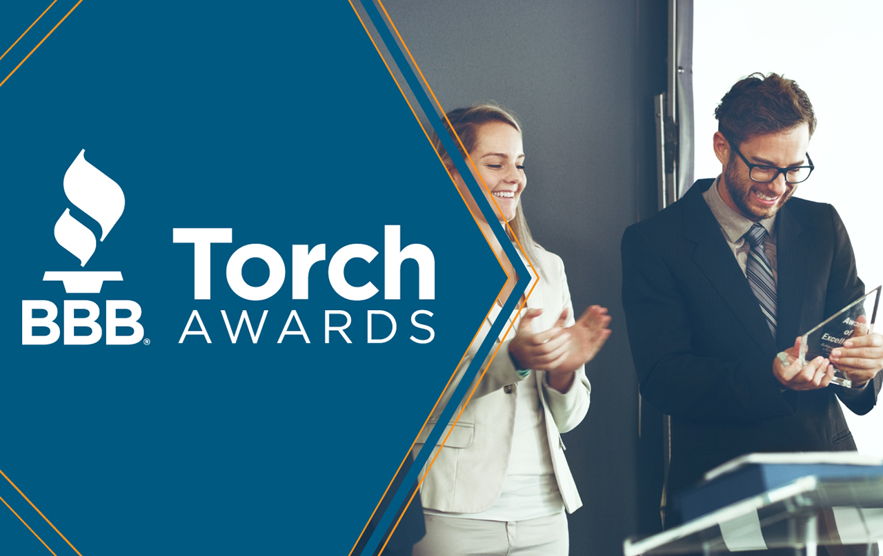 BBB torch awards - professional man receiving award